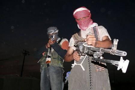 Two armed Iraqi insurgents - Photo by Menendj