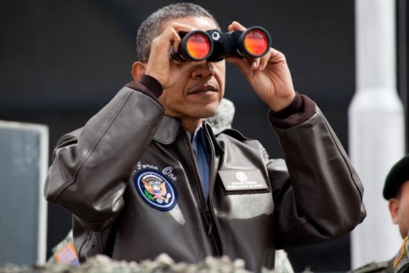 Barack Obama uses binoculars - Public Domain